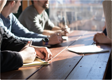 Group meeting on a bench